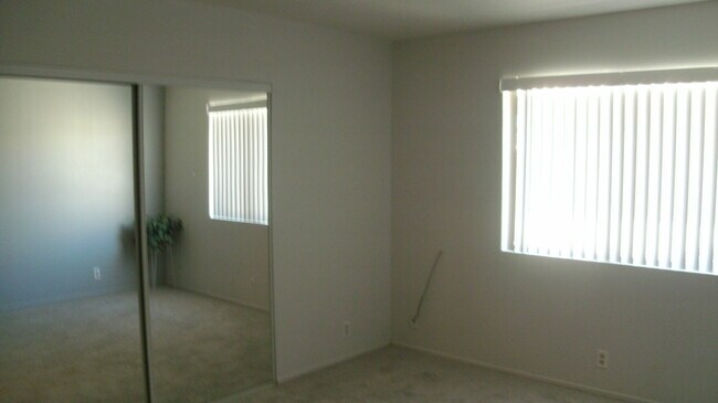 2nd BR Mirrored Wardrobe Doors - 41590 Maroon Town Rd