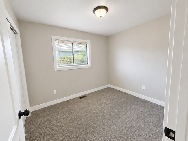 Building Photo - Spacious 4-Bedroom, 2-Bath Home with Updated Interior