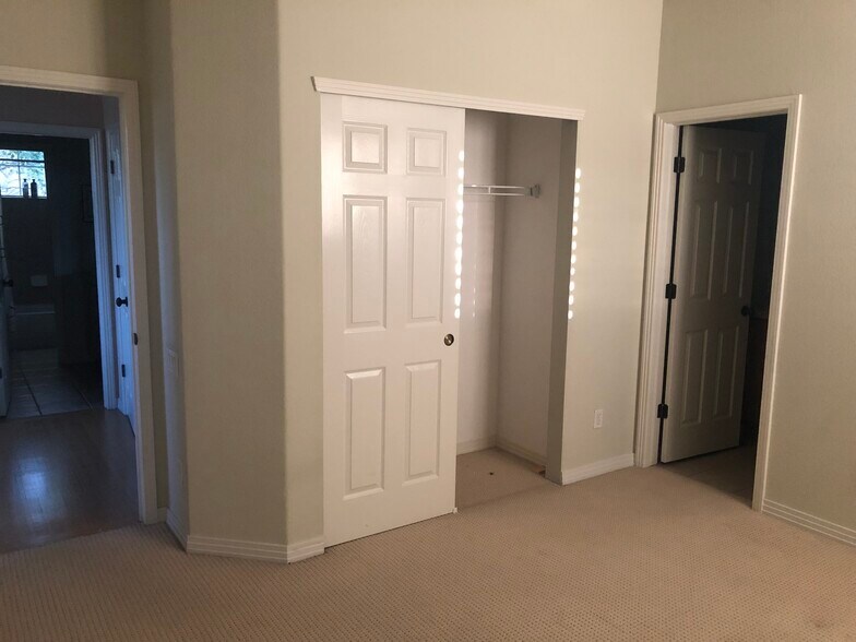 Upstairs bedroom & closet - 16909 W 63rd Ln