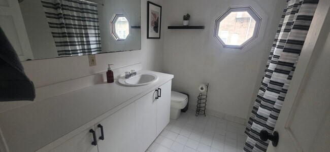 Building Photo - No Fee,  Nearly 3k Sq. ft Pet-Friendly Townhouse near Boston Landing with 2 Parking Spots Included!