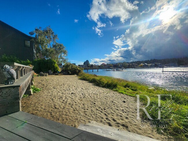 Building Photo - Waterfront Living in Indianola – Dock, Bea...
