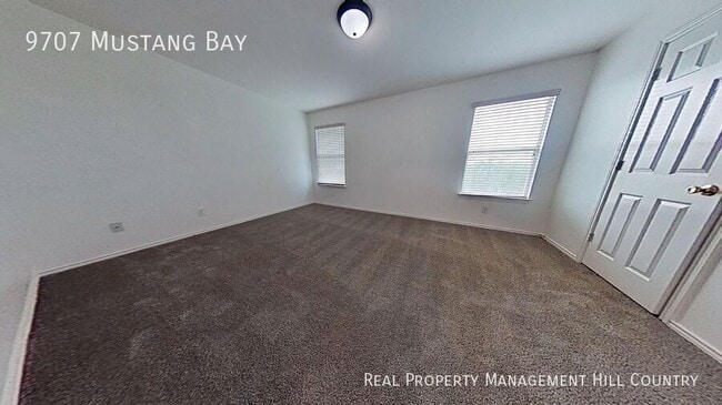Building Photo - 9707 Mustang Bay