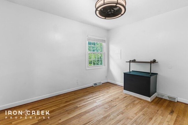 Building Photo - Beautifully Updated Three-Bedroom with Koi...