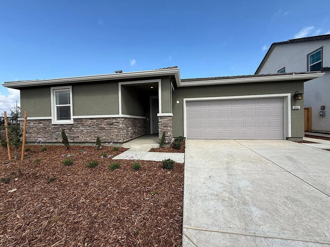 Building Photo - Be the first to enjoy this beautiful, newly built home near the Wild Hawk Golf Club