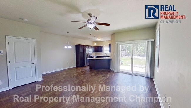 Building Photo - Beautiful Townhome with Open Floorplan and Covered Patio