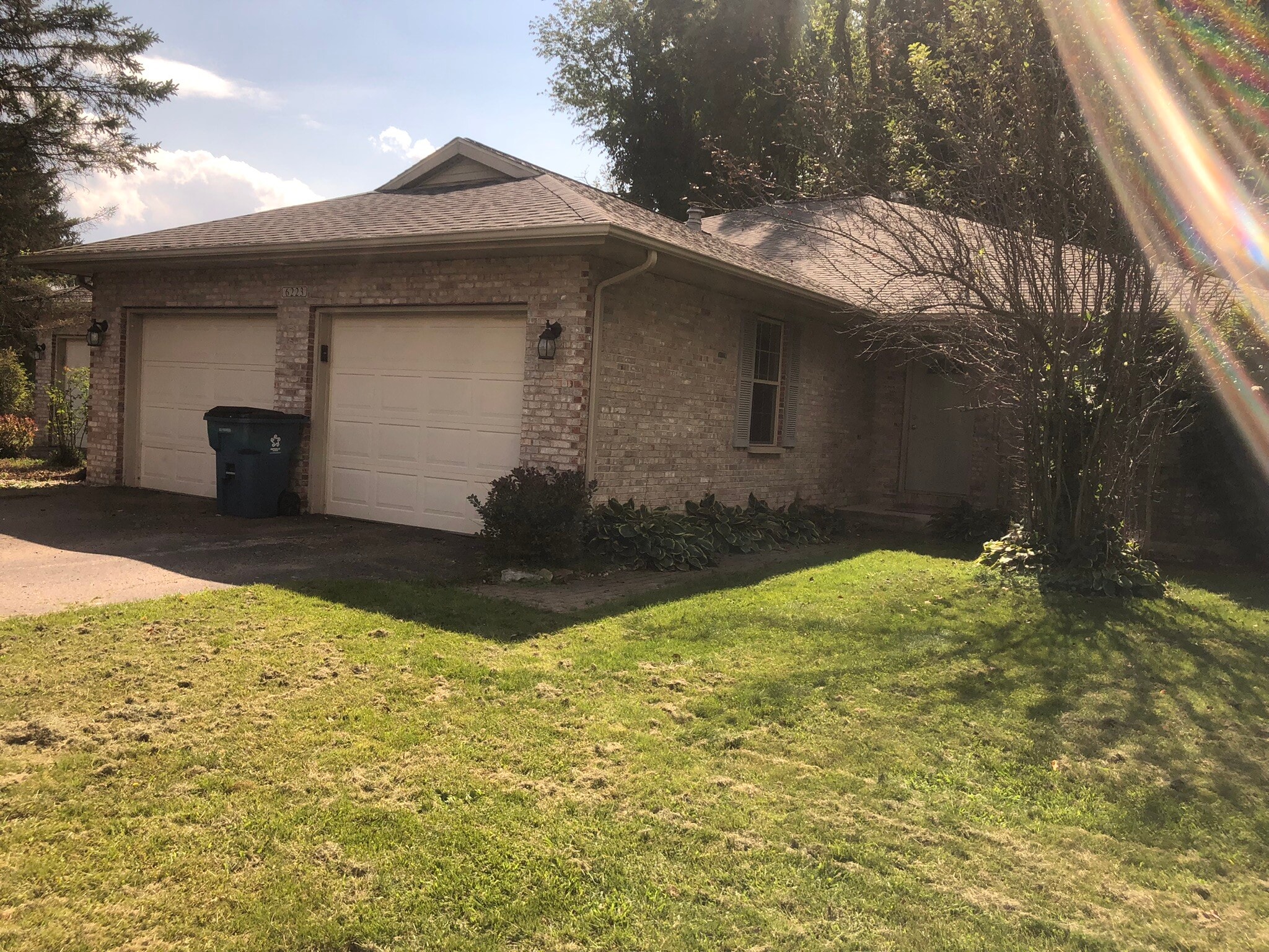 Home entry through two car garage - 6223 Cross Bend Ct