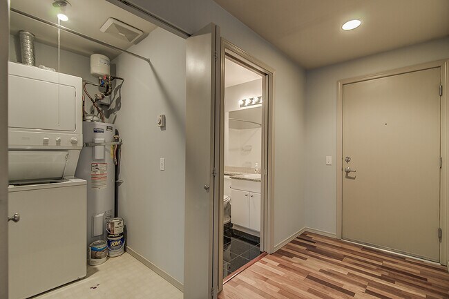Building Photo - Top floor corner one-bedroom in the heart of it all, don't miss out, tour today!