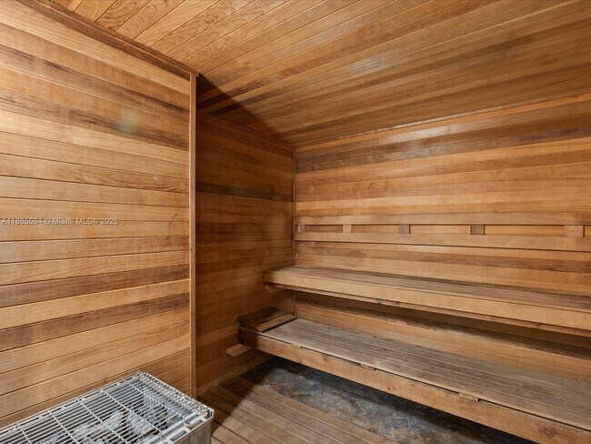 Building Photo - 10275 Collins Ave