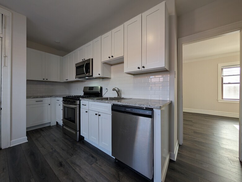 Building Photo - 5817 W Berteau Ave