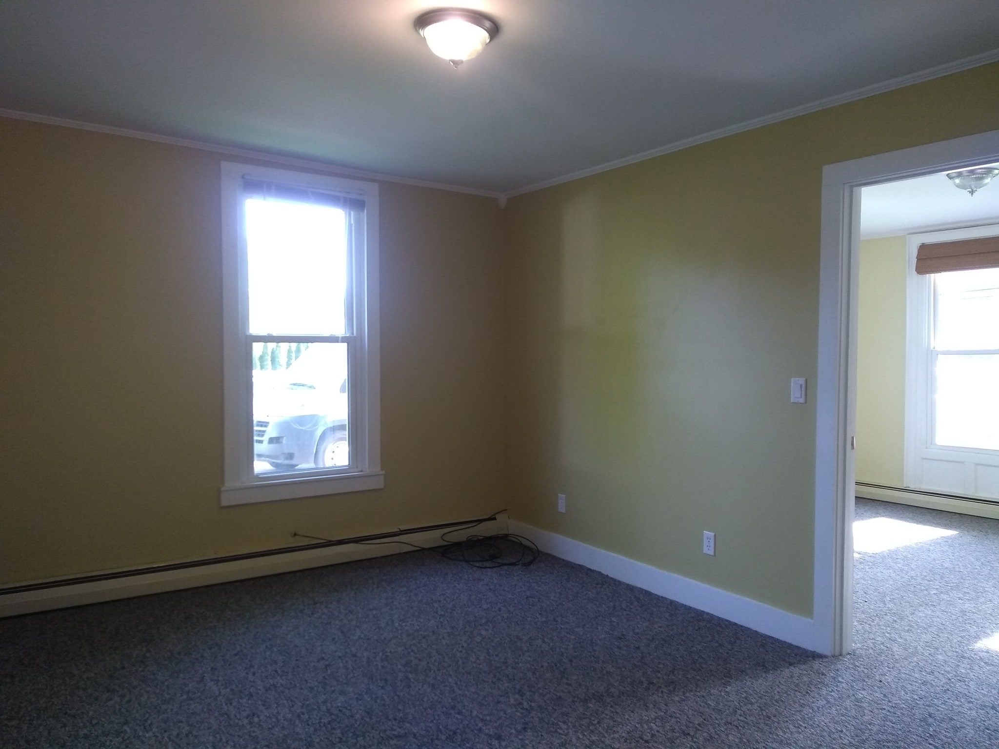 Living Room looking towards front bedroom - 100 N Main St