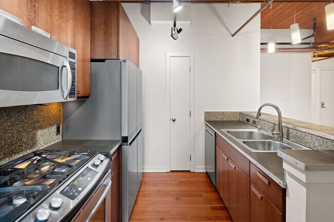 Building Photo - Exposed Beams in Historic Trace Lofts