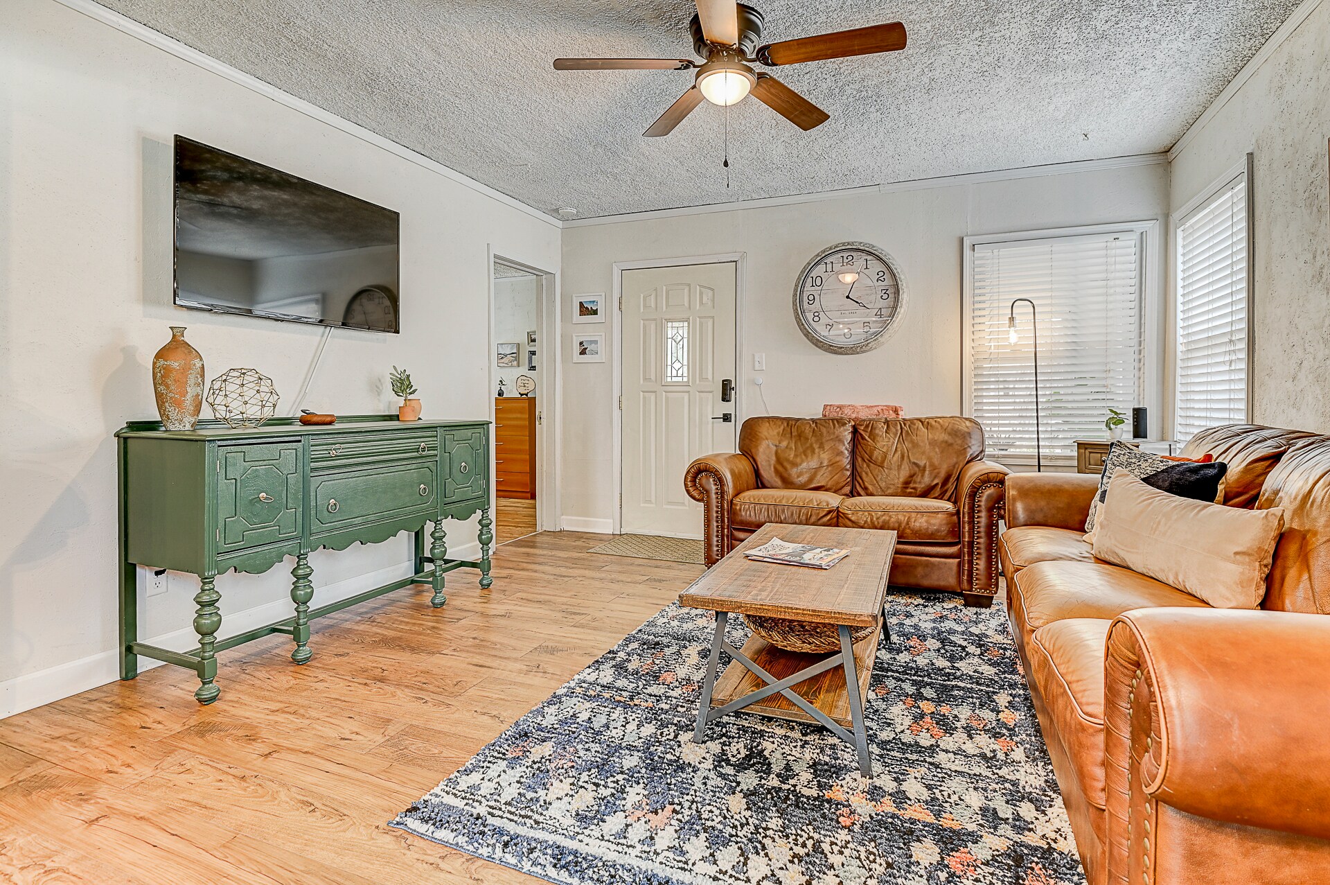 large TV with streaming services provided - 523 E Cache La Poudre St