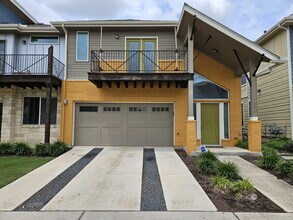 Building Photo - Experience Modern Living: Spacious 3-Bed, 3-Bath Townhome with Two Primary Bedrooms