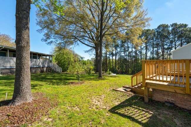 Building Photo - Introducing a Charming End Unit Townhouse ...