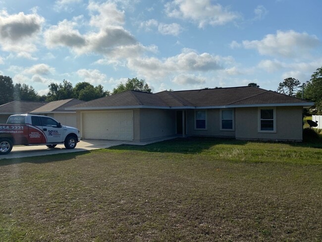 Building Photo - SILVER SPRINGS SHORES 3/2/2 - *WON'T LAST*