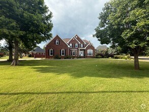 Building Photo - Spacious 5-Bedroom Home on a Corner Lot in...