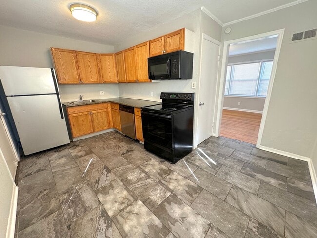 Building Photo - Updated 3 Bedroom Ranch with New Carpet, Fresh Paint, Fenced Yard & Basement!