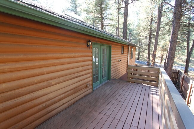Building Photo - 3 Bed, 2 Bath Cabin Home with Fenced Backyard & Balcony | Kachina Village