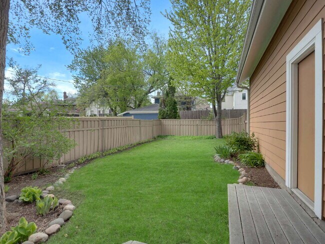 Building Photo - Spacious 4-Bed Gem with 3.5 Baths next to Minnehaha Creek