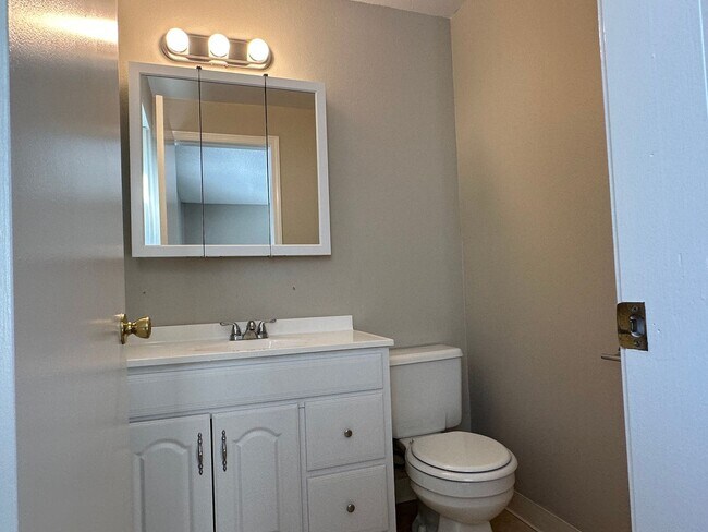 Building Photo - Spacious & Stylish 3BD Home with Iconic Stone Fireplace + Soaking Tub