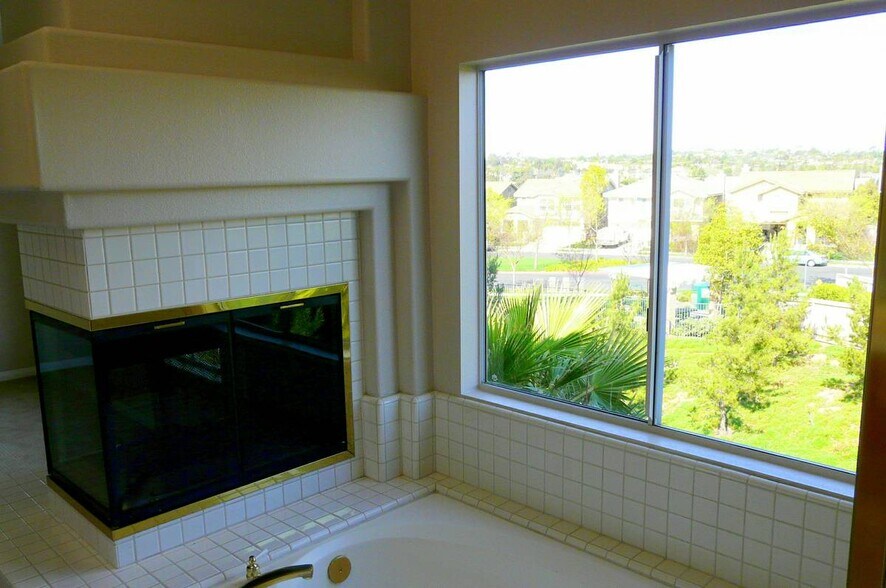 Master Bath w fireplace - 601 Aliento Ct