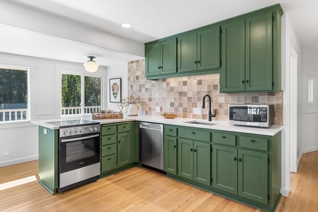 Building Photo - Freshly Remodeled Stunner Perched on the H...
