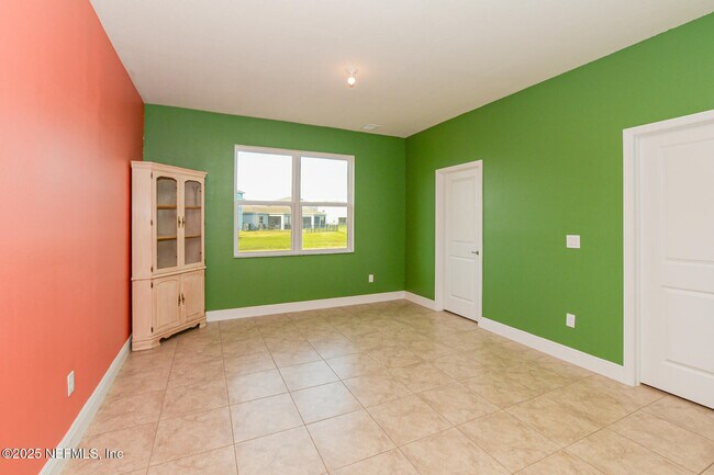 Building Photo - 10976 SW Tessili Wy