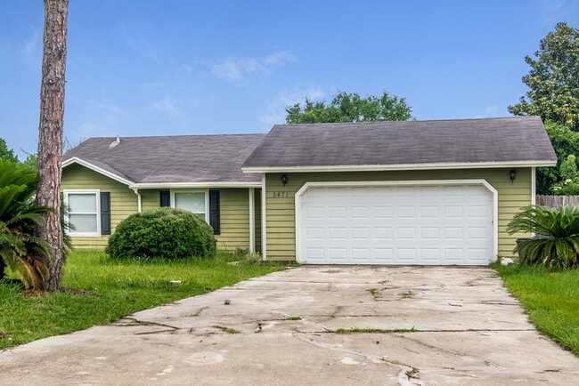 Building Photo - 8471 Pikes Peak Dr N