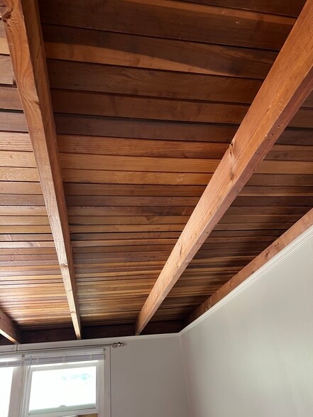 Bead board & beam detail in kitchen area - 75 Willow Dr