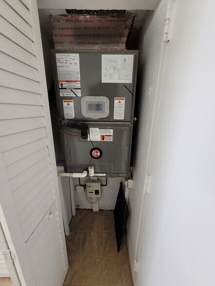 AC (unit was just serviced 1/22/26) and tankless water heater - 9143 SW 77th Ave