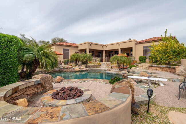 Building Photo - 7895 E Softwind Dr