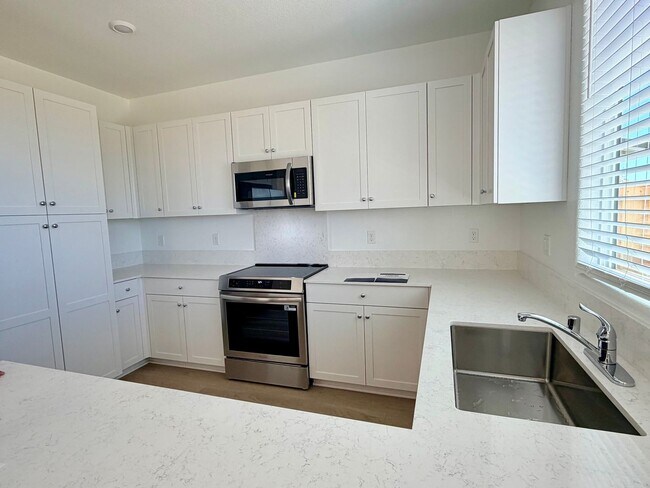 Building Photo - **Welcome to this beautifully designed 4-bedroom, 3-bathroom home offering modern living space.**