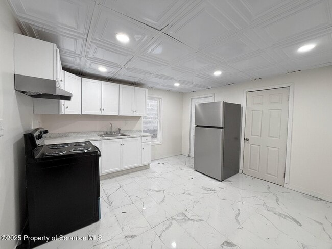 Building Photo - 210-212 Center Ave