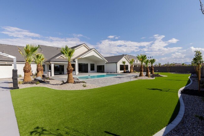 Building Photo - Gorgeous Custom Single Story with RV Garage