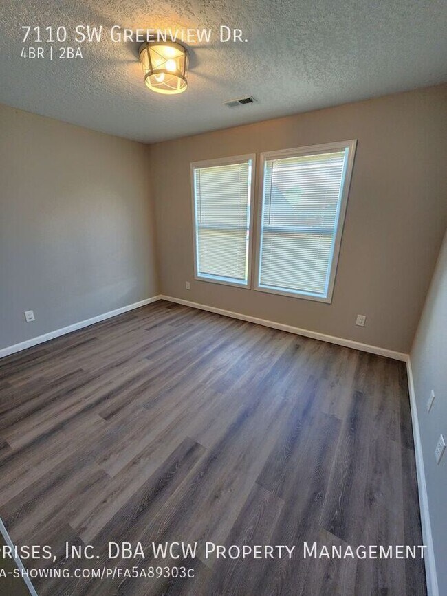 Building Photo - 7110 SW Greenview Dr