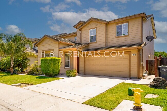 Building Photo - Charming 4-Bed, 2.5-Bath Home in Tracy’s E...