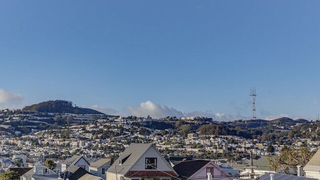 Building Photo - Spacious & Bright 2BR|1BA w/ One Garage Parking Spot Included