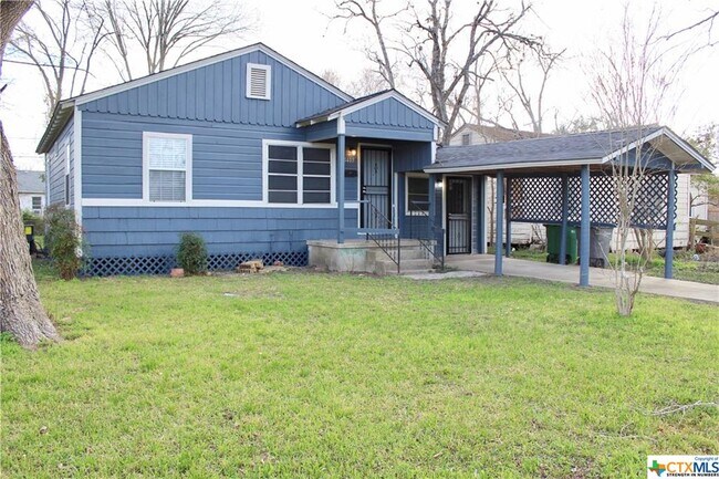 Building Photo - 1409 E Mistletoe Ave