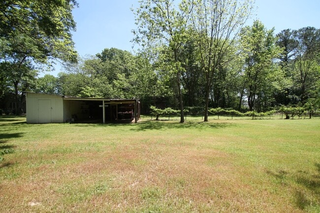 Building Photo - Exclusively Offered By Muse Realty Rentals, LLC