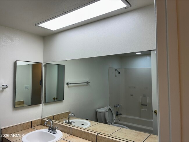 Building Photo - 8819 W Roma Ave