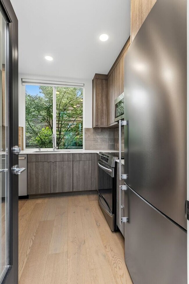 Building Photo - Air Conditioned Hilltop Gem w/ 360° Rooftop Ocean, Mountain and Skyline Views