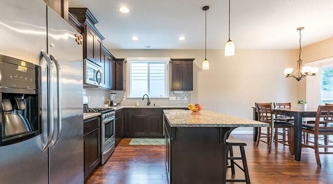 Building Photo - 3 bedroom Home Covered Patio home has AC !!!