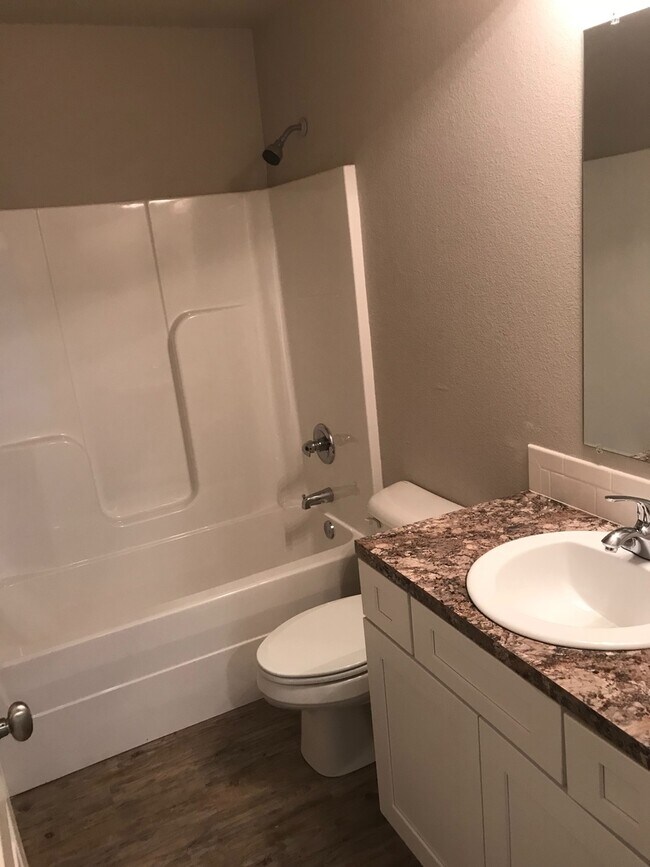 Building Photo - BH-OZIER TRIPLEX