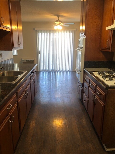 Kitchen from hallway - 4475 Rosewood Ave