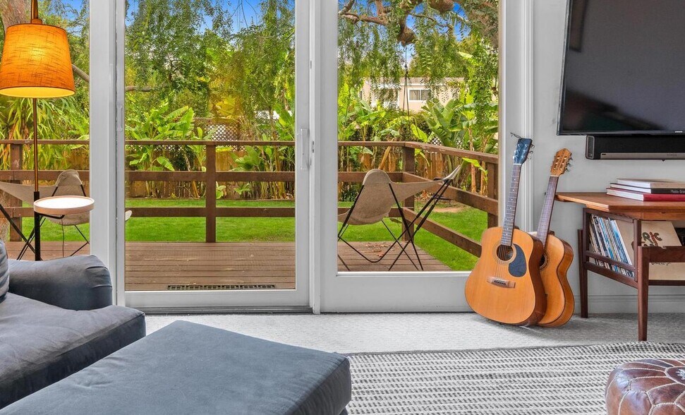 Living Room with views of backyard - 2697 Wilson St