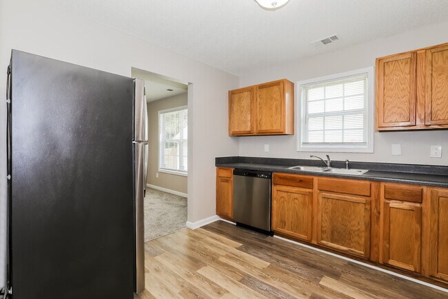 Building Photo - 6944 Red Bone Way