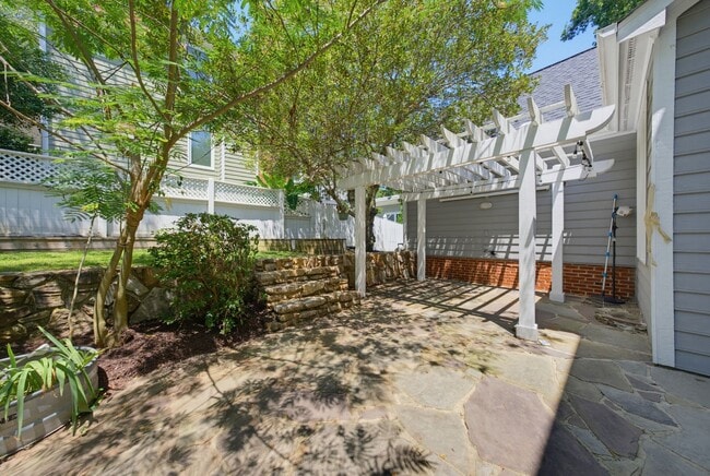 Building Photo - Southern Charm Meets Everyday Entertainment and Convenience!