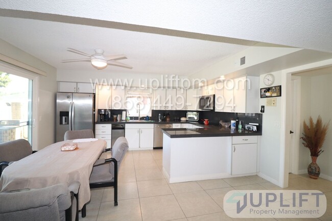 Building Photo - Spacious 4-Bed, 3-Bath Home with Unique Fe...