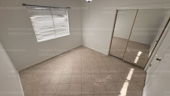 Building Photo - 3 bedroom 2 bathroom home on a corner lot with extra fenced parking.