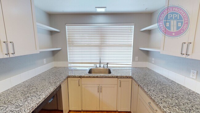 Building Photo - Updated Ranch, Large Fenced Backyard, 1 Pe...